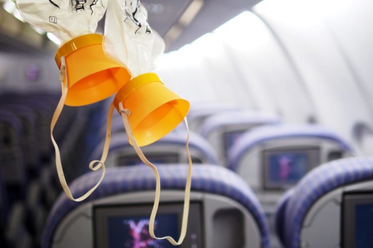 An image of oxygen masks on an airplane.